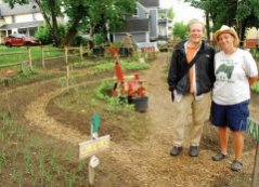 Paul Dreher and Jennifer Bernier at the Summer Street Community Garden. - CORIN HIRSCH